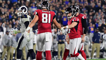 LOS ANGELES, CA - JANUARY 06: Kicker Matt Bryant #3 of the Atlanta Falcons celebrates his field goal with tight end Austin Hooper #81 to take a 16-10 lead in the third quarter of the NFC Wild Card Playoff game against the Los Angeles Rams at Los Angeles Coliseum on January 6, 2018 in Los Angeles, California. (Photo by Harry How/Getty Images)