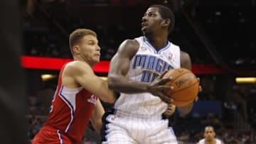 Nov 6, 2013; Orlando, FL, USA; Orlando Magic power forward Andrew Nicholson (44) drives to the basket as Los Angeles Clippers power forward Blake Griffin (32) defends during the second half at Amway Center. Orlando Magic defeated the Los Angeles Clippers 98-90. Mandatory Credit: Kim Klement-USA TODAY Sports