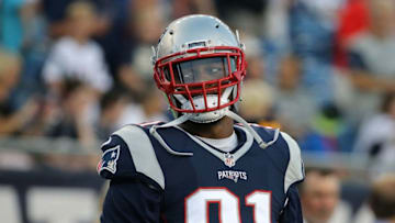 FOXBORO, MA - AUGUST 18: Jamie Collins #91 of the New England Patriots walks onto the field before a preseason game with the Chicago Bears in the first quarter at Gillette Stadium on August 18, 2016 in Foxboro, Massachusetts. (Photo by Jim Rogash/Getty Images)