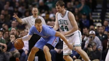 Mar 29, 2015; Boston, MA, USA; Boston Celtics center Tyler Zeller (44) defends against Los Angeles Clippers forward Blake Griffin (32) in the second half at TD Garden. The Clippers defeated the Celtics 119-106. Mandatory Credit: David Butler II-USA TODAY Sports