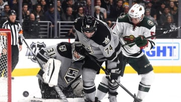 Jan 7, 2017; Los Angeles, CA, USA; Los Angeles Kings left wing Dwight King (74) and Los Angeles Kings goalie Peter Budaj (31) defend a shot on goal by Minnesota Wild center Erik Haula (56) in the third period of the game at Staples Center. Kings won 4-3 in overtime. Mandatory Credit: Jayne Kamin-Oncea-USA TODAY Sports