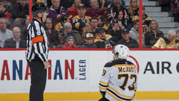 OTTAWA, ON - DECEMBER 9: Charlie McAvoy #73 of the Boston Bruins waits for a penalty call from referee Dan O'Halloran during an NHL game against the Ottawa Senators at Canadian Tire Centre on December 9, 2019 in Ottawa, Ontario, Canada. (Photo by Andre Ringuette/NHLI via Getty Images)