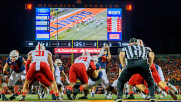 Sep 21, 2019; Champaign, IL, USA; Illinois Fighting Illini quarterback Brandon Peters (18) takes the snap before handing it off for a touchdown against the Illinois Fighting Illini during the first half at Memorial Stadium. Mandatory Credit: Patrick Gorski-USA TODAY Sports