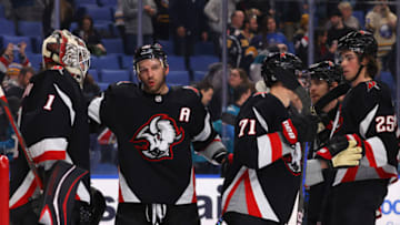 Dec 4, 2022; Buffalo, New York, USA; The Buffalo Sabres celebrate a win over the San Jose Sharks at KeyBank Center. Mandatory Credit: Timothy T. Ludwig-USA TODAY Sports