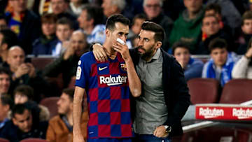 BARCELONA, SPAIN - MARCH 07: Sergio Busquets of FC Barcelona talks with his assistant Eder Sarabia during the Liga match between FC Barcelona and Real Sociedad at Camp Nou on March 07, 2020 in Barcelona, Spain. (Photo by Pedro Salado/Quality Sport Images/Getty Images)