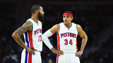 Mar 16, 2016; Auburn Hills, MI, USA; Detroit Pistons forward Marcus Morris (13) and forward Tobias Harris (34) talk during the first quarter against the Atlanta Hawks at The Palace of Auburn Hills. Mandatory Credit: Tim Fuller-USA TODAY Sports