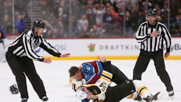 DENVER, CO - OCTOBER 11: Colorado Avalanche defenseman Nikita Zadorov (16) and Boston Bruins defenseman Adam McQuaid (54) fight during a regular season game between the Colorado Avalanche and the visiting Boston Bruins on October 11, 2017, at the Pepsi Center in Denver, CO. (Photo by Russell Lansford/Icon Sportswire via Getty Images)