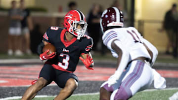 Auburn footballBrandon's Quincy Phillips Jr. (3) maneuvers to get past Picayune's Jamonta Waller (11) during play in Brandon, Miss., Friday, Aug. 25, 2023.
