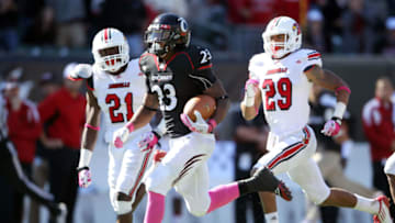 Isaiah Pead of the Cincinnati Bearcats runs for a touchdown during game against the Louisville Cardinals at Paul Brown Stadium. Getty Images.