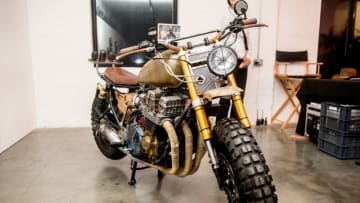 LONDON, ENGLAND - FEBRUARY 07: The unique custom motorbike made for Normun Reedus' character Daryl Dixon by Classified Moto consisting of parts of a 1992 Honda CB750 Nighthawk and a Yamaha YZF-R6 the modified bike is one of a kind seen during The Walking Dead: Art Apocalypse exhibition preview night at The Old Truman Brewery on February 7, 2019 in London, England. (Photo by Ollie Millington/Getty Images)