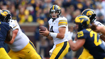 ANN ARBOR, MICHIGAN - OCTOBER 05: Nate Stanley #4 of the Iowa Hawkeyes looks to throw a fourth quarter pass against the Michigan Wolverines at Michigan Stadium on October 05, 2019 in Ann Arbor, Michigan. Michigan won the game 10-3. (Photo by Gregory Shamus/Getty Images)