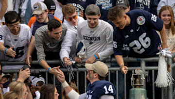 STATE COLLEGE, PA - SEPTEMBER 25: Sean Clifford #14 of the Penn State Nittany Lions celebrates with fans after the game against the Villanova Wildcats at Beaver Stadium on September 25, 2021 in State College, Pennsylvania. (Photo by Scott Taetsch/Getty Images)
