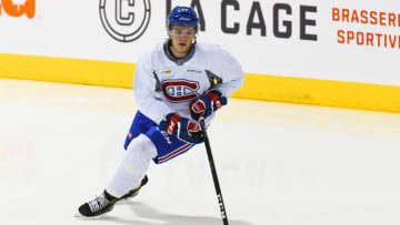 BROSSARD, QC - JULY 03: Montreal Canadiens Rookie center Jake Evans (52) skating with the puck in an exercise during the Montreal Canadiens Development Camp on July 3, 2017, at Bell Sports Complex in Brossard, QC (Photo by David Kirouac/Icon Sportswire via Getty Images)