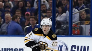 Mar 8, 2016; Tampa, FL, USA; Boston Bruins defenseman Torey Krug (47) passes the puck against the Tampa Bay Lightning during the first period at Amalie Arena. Mandatory Credit: Kim Klement-USA TODAY Sports