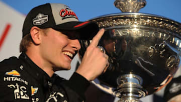 SONOMA, CA - SEPTEMBER 17: Josef Newgarden, driver of the #2 hum by Verizon Chevrolet, celebrates with the Astor Cup after winning the Verizon IndyCar championship following the Verizon IndyCar Series GoPro Grand Prix of Sonoma at Sonoma Raceway on September 17, 2017 in Sonoma, California. (Photo by Robert Reiners/Getty Images)