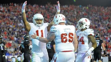 Sep 24, 2016; Evanston, IL, USA; Nebraska Cornhuskers tight end Cethan Carter (11) celebrates his touchdown with teammates against the Northwestern Wildcats during the second half at Ryan Field. Cornhuskers won 24-13. Mandatory Credit: Patrick Gorski-USA TODAY Sports