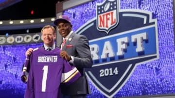 May 8, 2014; New York, NY, USA; Teddy Bridgewater (Louisville) poses with NFL commissioner Roger Goodell after being selected as the number thirty-two overall pick in the first round of the 2014 NFL Draft to the Minnesota Vikings at Radio City Music Hall. Mandatory Credit: Adam Hunger-USA TODAY Sports