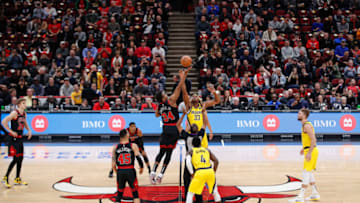 Mar 6, 2020; Chicago, Illinois, USA; Chicago Bulls center Wendell Carter Jr. (34) battles for the opening tip off against Indiana Pacers center Myles Turner (33) at at United Center. Mandatory Credit: Kamil Krzaczynski-USA TODAY Sports