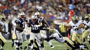 Aug 11, 2016; Foxborough, MA, USA; New England Patriots running back Tyler Gaffney (36) runs past the tackle of New Orleans Saints free safety Vonn Bell (48) for a touchdown during the second half at Gillette Stadium. Mandatory Credit: Bob DeChiara-USA TODAY Sports