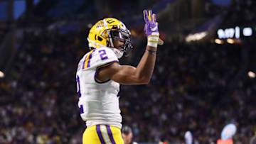 ATLANTA, GEORGIA - DECEMBER 28: Wide receiver Justin Jefferson #2 of the LSU Tigers celebrates his forth touchdown in the second quarter against the Oklahoma Sooners during the Chick-fil-A Peach Bowl at Mercedes-Benz Stadium on December 28, 2019 in Atlanta, Georgia. (Photo by Gregory Shamus/Getty Images)