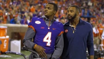 Nov 22, 2014; Clemson, SC, USA; Clemson Tigers quarterback Deshaun Watson (4) talks with former Clemson Tigers quarterback Tajh Boyd (right) during the fourth quarter at Clemson Memorial Stadium. Tigers won 28-0. Mandatory Credit: Joshua S. Kelly-USA TODAY Sports