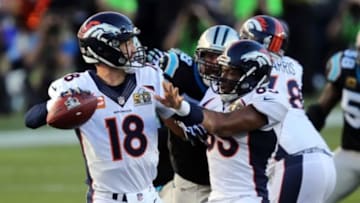 Feb 7, 2016; Santa Clara, CA, USA; Denver Broncos quarterback Peyton Manning (18) throws against the Carolina Panthers during the first quarter in Super Bowl 50 at Levi