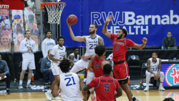 Sandro Mamukelashvili attempts a layup against the St. John's basketball team (Vincent Carchietta-USA TODAY Sports)