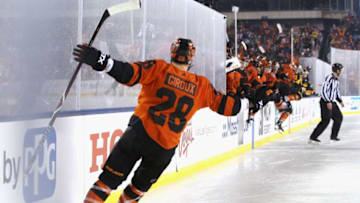 PHILADELPHIA, PA - FEBRUARY 23: Claude Giroux #28 of the Philadelphia Flyers celebrates after scoring the game-winning goal in overtime during the 2019 Coors Light NHL Stadium Series game between the Pittsburgh Penguins and the Philadelphia Flyers at Lincoln Financial Field on February 23, 2019 in Philadelphia, Pennsylvania. The Flyers defeated the Penguins 4-3 in overtime. (Photo by Andre Ringuette/NHLI via Getty Images)