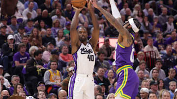 Oct 25, 2023; Salt Lake City, Utah, USA; Sacramento Kings forward Harrison Barnes (40) shoots the ball past Utah Jazz guard Jordan Clarkson (00) during the first quarter at Delta Center. Mandatory Credit: Chris Nicoll-USA TODAY Sports