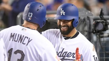 LOS ANGELES, CA - JULY 02: Max Muncy #13 of the Los Angeles Dodgers is congratulated by Matt Kemp #27 after Munch hit a home run in the fourth inning at Dodger Stadium on July 2, 2018 in Los Angeles, California. (Photo by John McCoy/Getty Images)