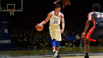 PHILADELPHIA, PA - APRIL 14: Markelle Fultz #20 of the Philadelphia 76ers handles the ball against the Miami Heat in game one of round one of the 2018 NBA Playoffs on April 14, 2018 at Wells Fargo Center in Philadelphia, Pennsylvania NOTE TO USER: User expressly acknowledges and agrees that, by downloading and/or using this Photograph, user is consenting to the terms and conditions of the Getty Images License Agreement. Mandatory Copyright Notice: Copyright 2018 NBAE (Photo by Jesse D. Garrabrant/NBAE via Getty Images)