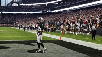 LAS VEGAS, NEVADA - DECEMBER 18: Keelan Cole #84 of the Las Vegas Raiders celebrates after scoring the tying touchdown during an NFL football game between the Las Vegas Raiders and the New England Patriots at Allegiant Stadium on December 18, 2022 in Las Vegas, Nevada. (Photo by Michael Owens/Getty Images)