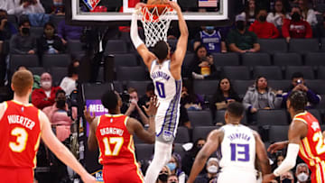 Jan 5, 2022; Sacramento, California, USA; Sacramento Kings guard Tyrese Haliburton (0) dunks the ball against the Atlanta Hawks during the second quarter at Golden 1 Center. Mandatory Credit: Kelley L Cox-USA TODAY Sports