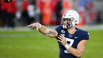Nov 7, 2020; University Park, Pennsylvania, USA; Penn State Nittany Lions quarterback Will Levis (7) warms up during a time-out Maryland Terrapins during the second quarter at Beaver Stadium. Mandatory Credit: Rich Barnes-USA TODAY Sports