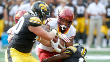 IOWA CITY, IOWA- SEPTEMBER 08: Runningback Sheldon Croney #25 of the Iowa State Cyclones is brought down during the first half by defensive back Michael Ojemudia #11 of the Iowa Hawkeyes on September 8, 2018 at Kinnick Stadium, in Iowa City, Iowa. (Photo by Matthew Holst/Getty Images)