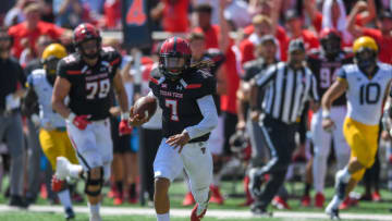 LUBBOCK, TX - SEPTEMBER 29: Jett Duffey #7 of the Texas Tech Red Raiders finds running room during the second half of the game against the West Virginia Mountaineers on September 29, 2018 at Jones AT&T Stadium in Lubbock, Texas. West Virginia defeated Texas Tech 42-34. (Photo by John Weast/Getty Images)