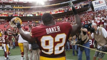Sep 14, 2014; Landover, MD, USA; Washington Redskins defensive end Chris Baker (92) walks off the filed after the game against the Jacksonville Jaguars at FedEx Field. The Redskins won 41-10. Mandatory Credit: Geoff Burke-USA TODAY Sports