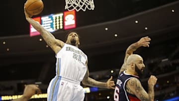 Mar 11, 2015; Denver, CO, USA; Denver Nuggets forward Wilson Chandler (21) dunks the ball against Atlanta Hawks forward Pero Antic (6) during the second half at Pepsi Center. The Nuggets won 115-102. Mandatory Credit: Chris Humphreys-USA TODAY Sports