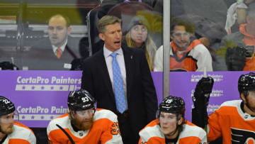Nov 27, 2018; Philadelphia, PA, USA; Philadelphia Flyers head ocas Dave Hakstol behind the bench against the Ottawa Senators during the third period at Wells Fargo Center. Mandatory Credit: Eric Hartline-USA TODAY Sports