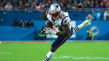 MIAMI GARDENS, FL - DECEMBER 11: Dwayne Allen #83 of the New England Patriots makes the catch during the second quarter against the Miami Dolphins at Hard Rock Stadium on December 11, 2017 in Miami Gardens, Florida. (Photo by Chris Trotman/Getty Images)