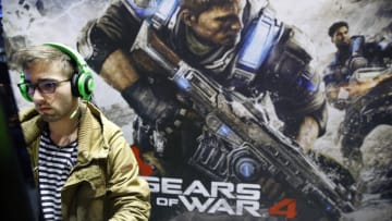 PARIS, FRANCE - OCTOBER 28: A gamer plays the video game "Gears of War 4" developed by "The Coalition" and published by Microsoft Studios on Sony PlayStation game consoles PS4 during the "Paris Games Week" on October 28, 2016 in Paris, France. "Paris Games Week" is an international trade fair for video games to be held from October 27 to October 31, 2016. (Photo by Chesnot/Getty Images)