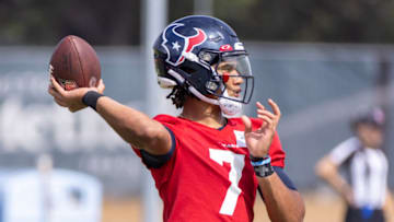 Jun 14, 2023; Houston, Texas, USA; Houston Texans quarterback C.J. Stroud (7) drops back to throw during the Texans minicamp at the Houston Texans Methodist Training Center. Mandatory Credit: Thomas Shea-USA TODAY Sports