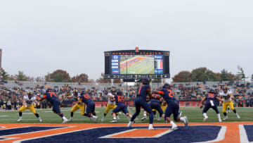 CHAMPAIGN, IL - NOVEMBER 17: Illinois Fighting Illini quarterback AJ Bush (1) hands the ball off to Illinois Fighting Illini running back Ra'Von Bonner (21) in their own end zone during the Big Ten Conference college football game between the Iowa Hawkeyes and the Illinois Fighting Illini on November 17, 2018, at Memorial Stadium in Champaign, Illinois. (Photo by Michael Allio/Icon Sportswire via Getty Images)