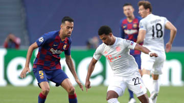 Barcelona midfielder Sergio Busquets linked with a move to Bayern Munich. (Photo by MANU FERNANDEZ/POOL/AFP via Getty Images)