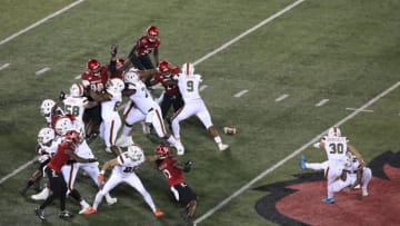 LOUISVILLE, KENTUCKY - SEPTEMBER 19: Jose Borregales #30 of the Miami Hurricanes kicks a field goal against the Louisville Cardinals at Cardinal Stadium on September 19, 2020 in Louisville, Kentucky. (Photo by Andy Lyons/Getty Images)