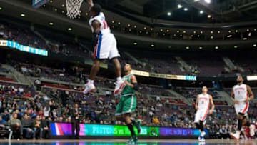 Nov 18, 2012; Auburn Hills, MI, USA; Detroit Pistons point guard Will Bynum (12) slam dunks during the fourth quarter against the Boston Celtics at The Palace. Detroit won 103-83. Mandatory Credit: Tim Fuller-USA TODAY Sports