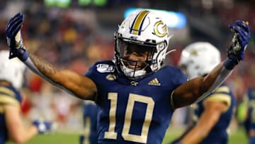 ATLANTA, GA - NOVEMBER 21: Ahmarean Brown #10 of the Georgia Tech Yellow Jackets reacts after a GT touchdown during the second half against the North Carolina State Wolfpack at Bobby Dodd Stadium on November 21, 2019 in Atlanta, Georgia. (Photo by Todd Kirkland/Getty Images)