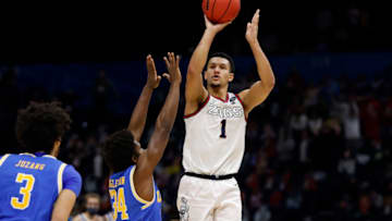 Jalen Suggs' buzzer beater compared to iconic Duke basketball shot (Photo by Jamie Squire/Getty Images)