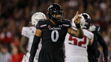 Cincinnati Bearcats linebacker Darrian Beavers celebrates sack against Temple Owls at Nippert Stadium. USA Today.