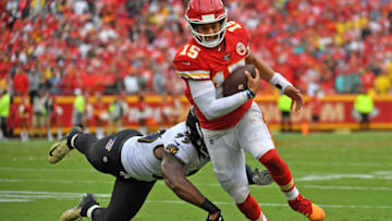 KANSAS CITY, MO - SEPTEMBER 22: Quarterback Patrick Mahomes #15 of the Kansas City Chiefs runs to the outside against outside linebacker Matt Judon #99 of the Baltimore Ravens during the second half at Arrowhead Stadium on September 22, 2019 in Kansas City, Missouri. (Photo by Peter G. Aiken/Getty Images)